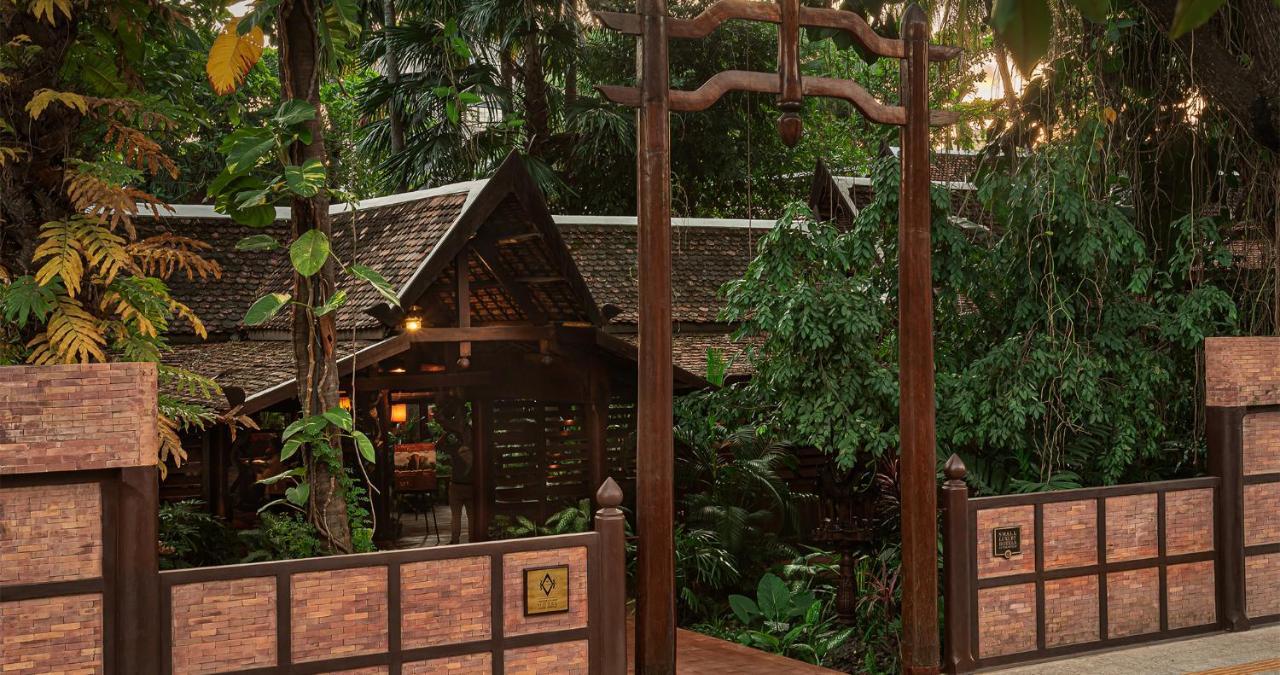 Angkor Village Hotel - Small Luxury Hotels Of The World Сиемрип Экстерьер фото Entrance to a traditional Thai house